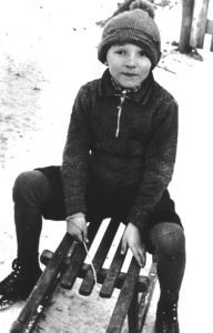 Bild mit Fritz Wunderlich als Kind auf dem Schlitten